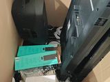 a box full of electronic equipment in a room
