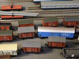 a lot of toy trains that are on the tracks