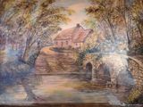 a painting on the wall of a house with a bridge