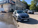 a car that is parked in front of a building
