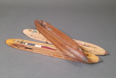 three different types of wooden items on the table