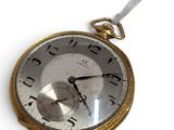 a silver and gold pocket watch on a white background