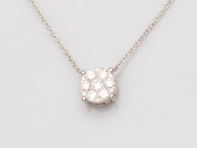 a diamond cluster pendant on a chain
