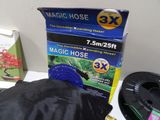 a box of magic hose next to a bag of magic hose