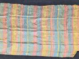 a piece of cloth that has been folded up on a table