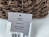 a rope with a tag on it sitting on a table