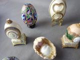 many different types of eggs on display on a table