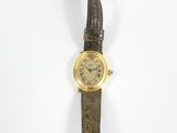 an image of a wrist watch with a curved band and roman numerals on the face