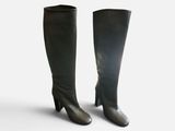 pair of black knee high boots on a white background