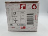 a box of wine sitting on a table with a wine glass