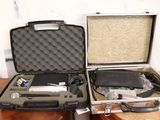 two suitcases that are sitting on a table