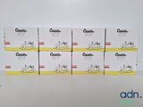 four boxes of cartons of cigarettes sitting on top of a table