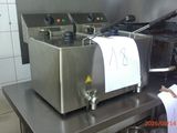 an image of a commercial fryer in a commercial kitchen