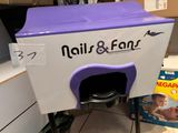 a purple and white machine that has a baby inside of it