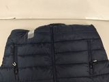 the back of a black puffy vest with zippers on it