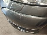 a close up of the front bumper of a car
