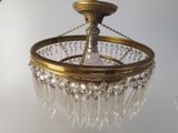 a chandelier hanging from the ceiling in a room