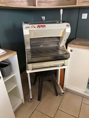 a machine that is sitting in a kitchen next to a counter