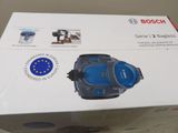 boxed box of a vacuum cleaner on a table with a european flag on it