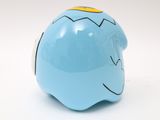 a blue piggy bank sitting on a white surface