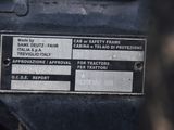 a close up of a sign on a vehicle ' s dashboard