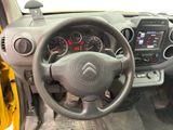 the interior of a car with a steering wheel and dashboard controls