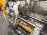 a machine that is working on a piece of metal