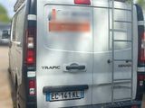 a white van that is parked in a parking lot