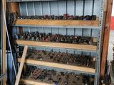 a shelf full of assorted tools in a garage