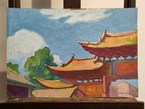 a picture of a painting on a easel in a room