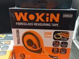 two boxes of wokin tape sitting on a table next to each other