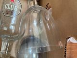 two empty wine glasses sitting in a cardboard box