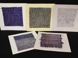quatre cartes de couleurs et de motifs différents sur un fond noir