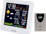 un gros plan d'une station météo équipée d'une horloge et d'une télécommande