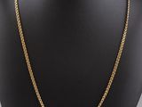 a gold chain necklace on a mannequin mannequin mannequin mannequin mannequin mannequin mannequin mannequin manne