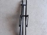 a metal object that is on the wall next to a wall