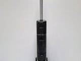 an image of a vacuum cleaner sitting on top of a table