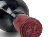 a bottle of wine that is sitting on a table