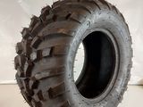a tire that is sitting on a white surface