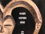 a book with a picture of a mask on it