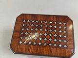 a small wooden box that is sitting on a table