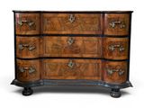 an antique chest of drawers with a wooden top and metal handles