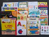 many children ' s books on the table together
