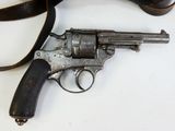a gun that is sitting on a table