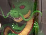 a dragon figurine in the box of a toy