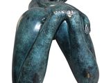 statue of a woman holding a baby in her arms