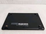 an image of a laptop with a battery on top of it