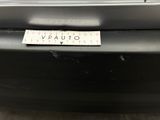 a close up of a car ' s bumper with a sticker on it
