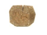a piece of stone that has been cut in half