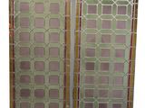 pair of antique stained glass windows with geometric designs